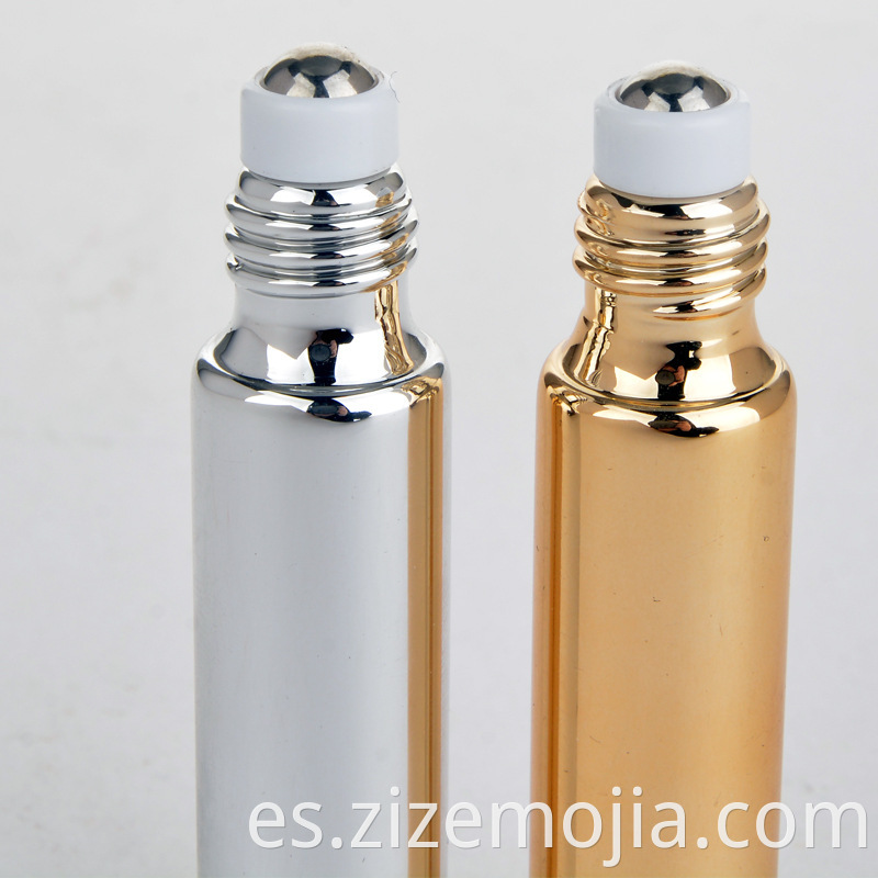 Rollo de aceite esencial de vidrio UV dorado de 10 ml y 5 ml en botella, embotellado de crema para ojos de masaje